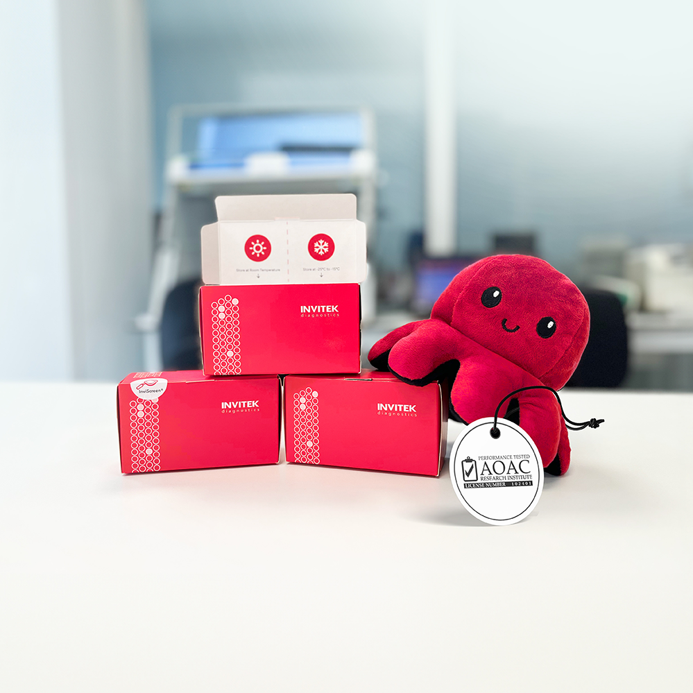 red boxes containing real time PCR reagents with Invitek mascot alongside.